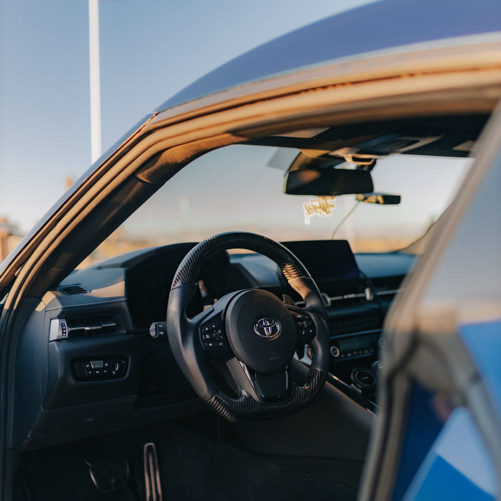 2019-2026+ Toyota Supra Custom Carbon Fiber Steering Wheel - AutoLEDTech.com