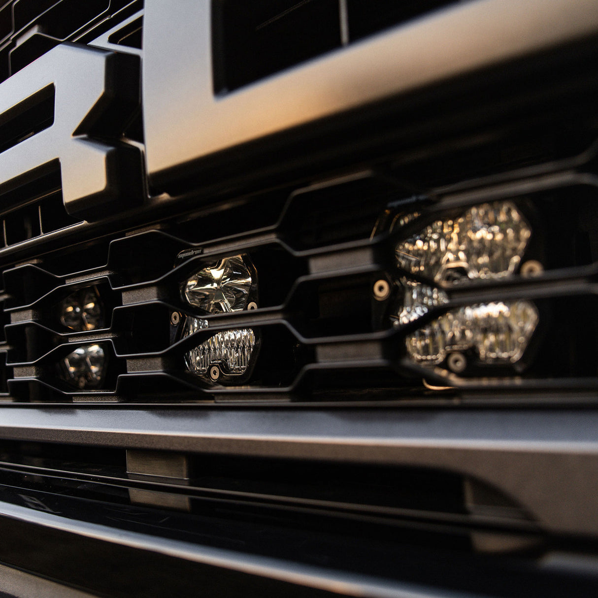 2021-2026+ Ford Raptor Baja Designs Squadron 2.0 Behind-The-Grill Light Kit - AutoLEDTech.com