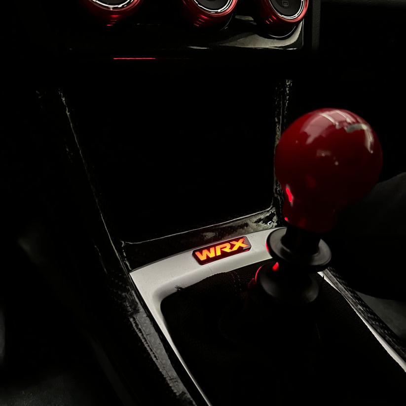 2015-2021 WRX RGBW Flow Series LED Shifter Trim Badge - Lit Logos