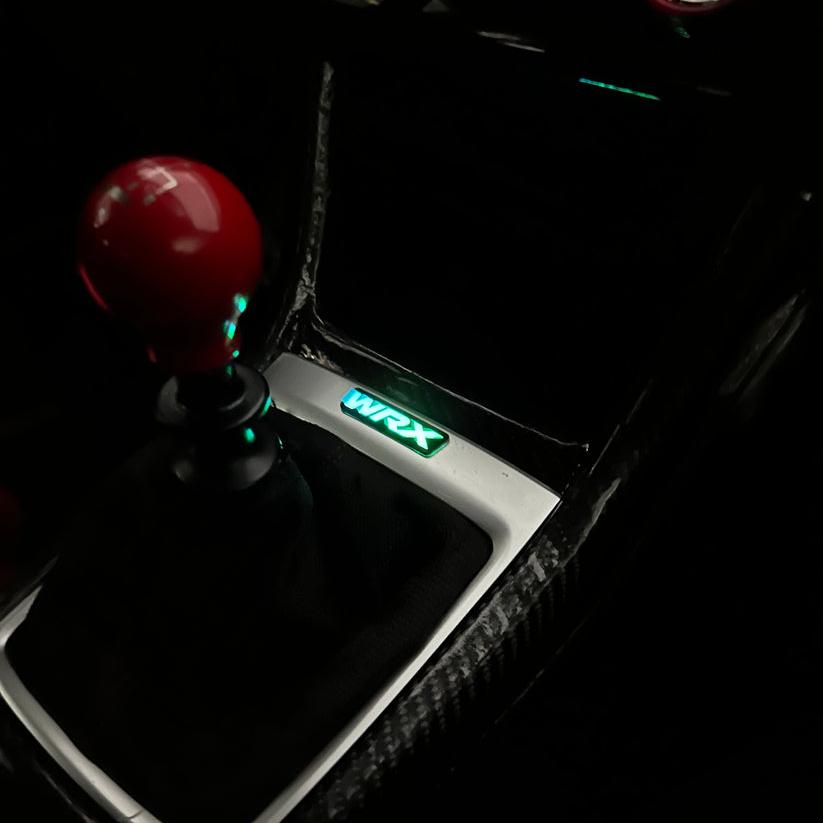 2015-2021 WRX RGBW Flow Series LED Shifter Trim Badge - Lit Logos