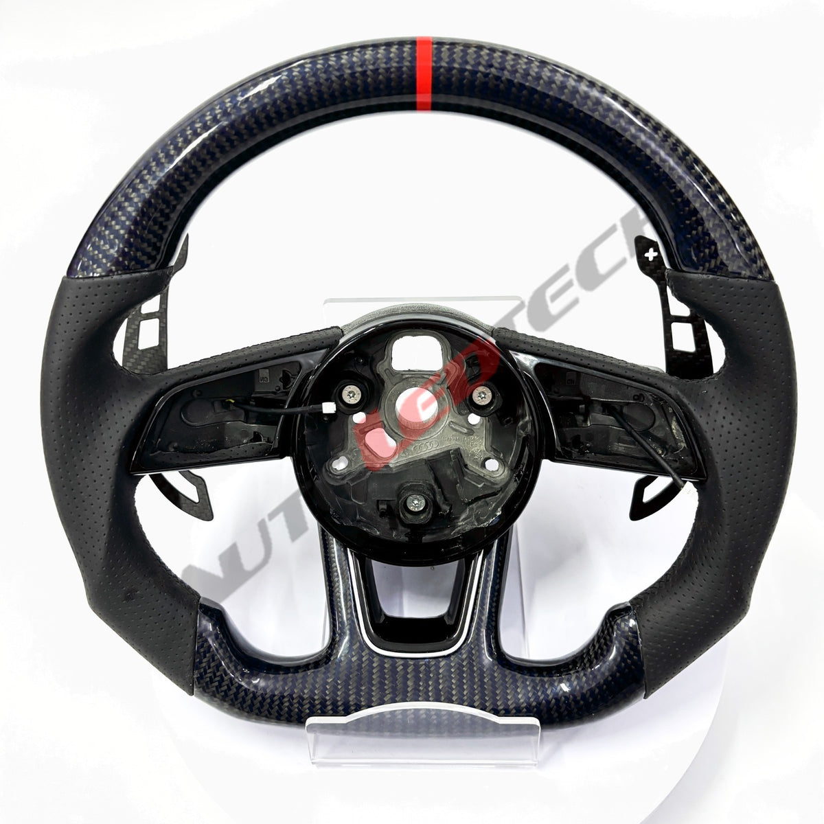 Audi B9 magnetic paddle shifters installed on carbon fiber steering wheel