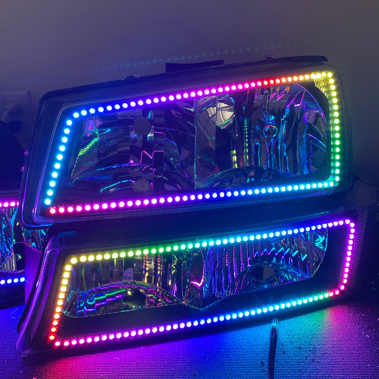 2003-2006 Chevrolet Silverado/Avalanche Prebuilt RGBW Color-Chasing LED Halo Headlights LED headlight kit AutoLEDTech Oracle Lighting Trendz Flow Series RGBHaloKits OneUpLighting Morimoto