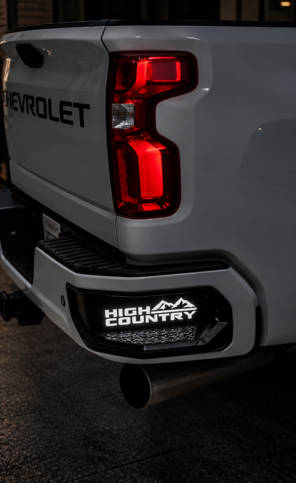 2019-2027+ GMC/Chevy 1500 Illuminated Rear Bumper Corner Step Inserts (Silverado/ Sierra) - AutoLEDTech.com