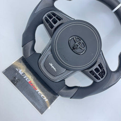 2019-2026+ Toyota Supra Custom Carbon Fiber Steering Wheel - AutoLEDTech.com