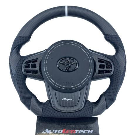2019-2026+ Toyota Supra Custom Carbon Fiber Steering Wheel - AutoLEDTech.com