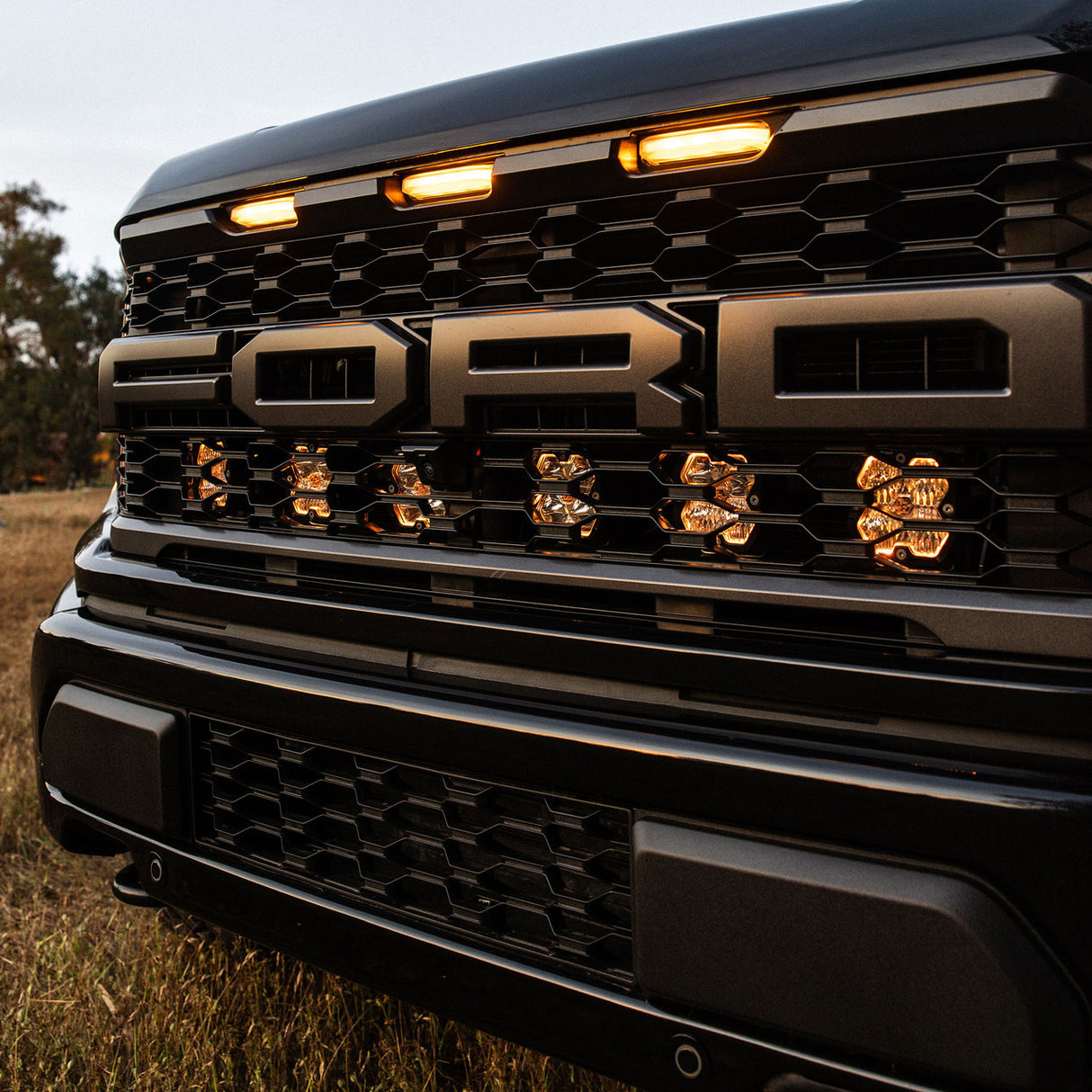2021-2026+ Ford Raptor Baja Designs Squadron 2.0 Behind-The-Grill Light Kit - AutoLEDTech.com