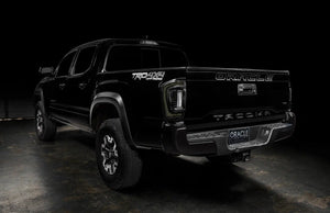 Rear three quarter view of Tacoma with smoked flush mount LED tail lights