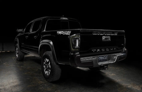 Rear three quarter view of Tacoma with smoked flush mount LED tail lights