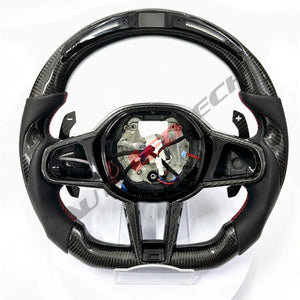 BMW G-Series magnetic paddle shifters installed on carbon fiber LED steering wheel