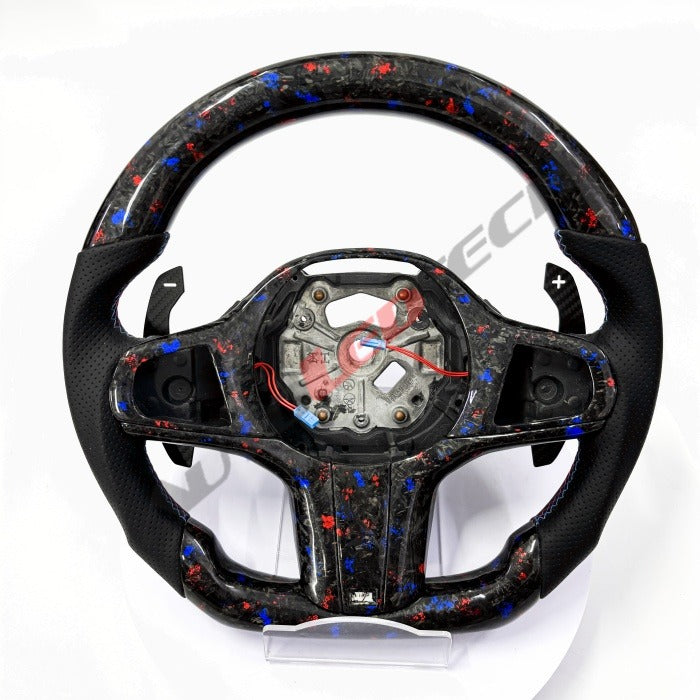 BMW G-Series magnetic paddle shifters installed on forged carbon steering wheel