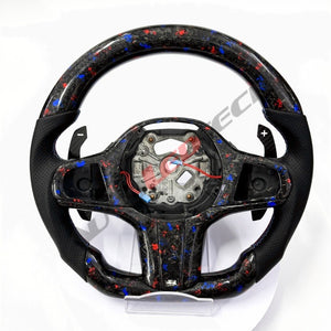 BMW G-Series magnetic paddle shifters installed on forged carbon steering wheel