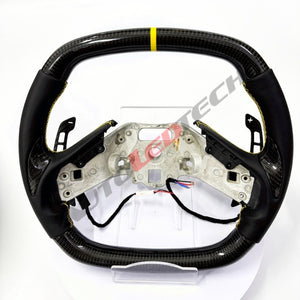 C8 Corvette magnetic paddle shifters installed on carbon fiber steering wheel