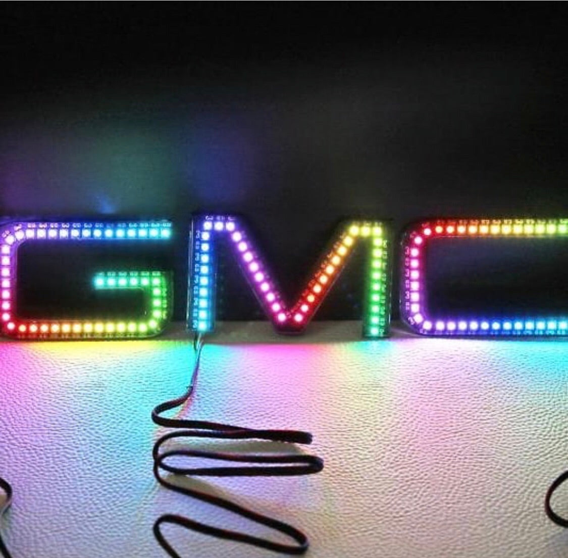 Illuminated GMC RGBW LED Badge Emblem Logo (RGBW | Flow Series) LED headlight kit AutoLEDTech Oracle Lighting Trendz Flow Series RGBHaloKits OneUpLighting Morimoto