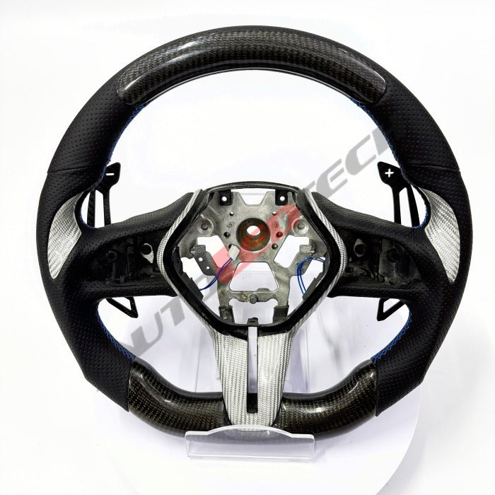 Infiniti Q50 Q60 magnetic paddle shifters installed on carbon fiber steering wheel