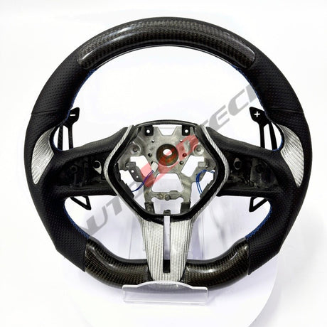 Infiniti Q50 Q60 magnetic paddle shifters installed on carbon fiber steering wheel