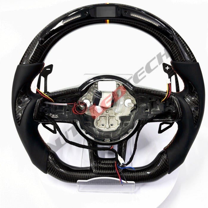 VW Golf MK7 magnetic paddle shifters installed on carbon fiber LED steering wheel